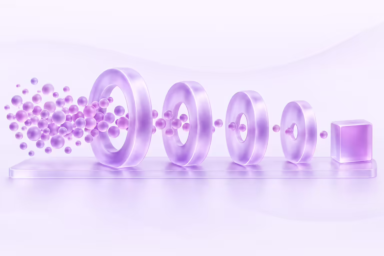 Pale violet illustration of four upright frosted glass rings in a row with steadily smaller openings; a dense cloud of small glass spheres enters the widest ring on the left, progressively fewer pass through each ring, and a single glass cube rests alone at the right end.